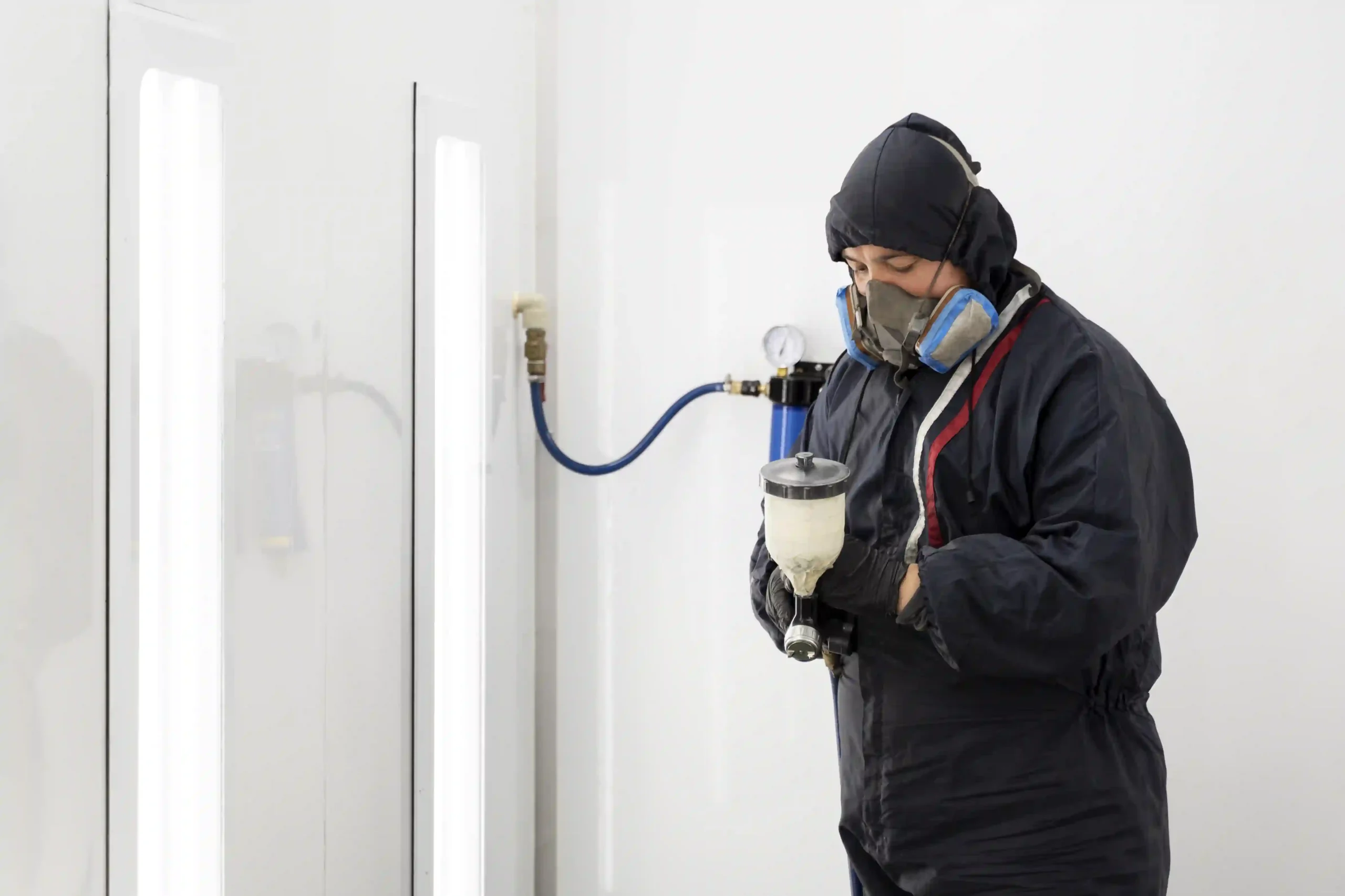 service worker painting car